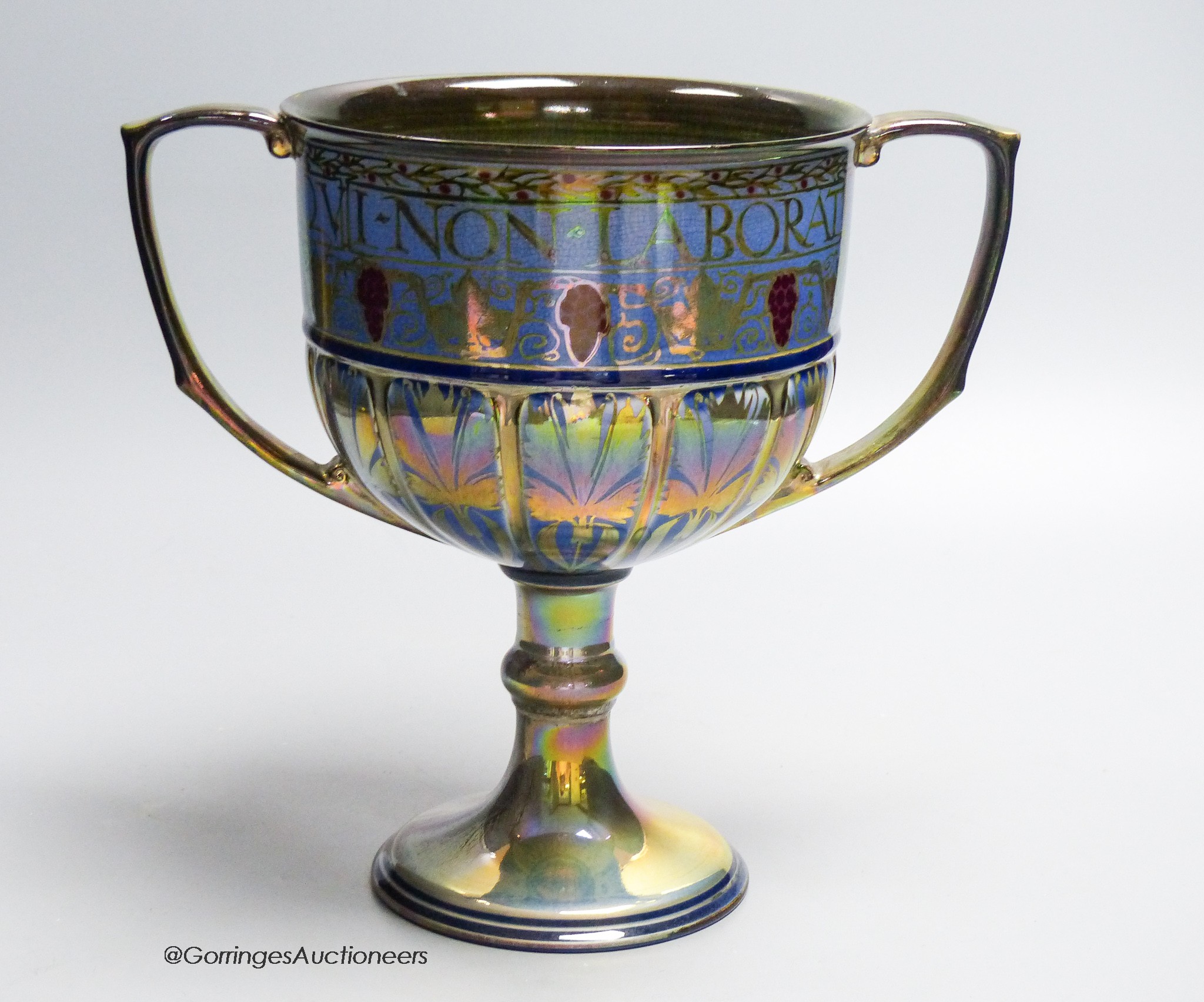 A Pilkingtons Royal Lancastrian lustre loving cup, monogram for Gordon M Forsyth, height 24cm (a.f.)